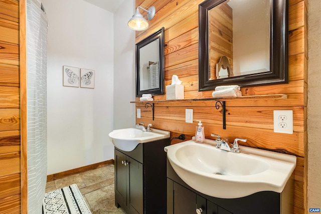 1900 Lowesville Rd, Amherst, VA 24521 - full bathroom featuring baseboards, two vanities, and stone finish floors