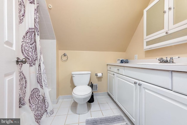 full bathroom featuring visible vents, toilet, vanity, baseboards, and tile patterned floors