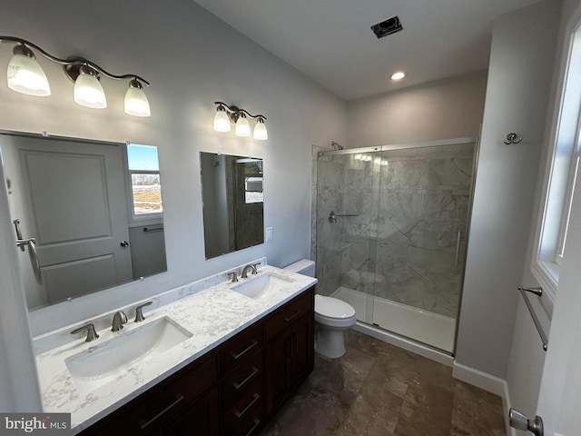 1078 Fishback Rd, Madison, VA 22727 - bathroom with a stall shower, double vanity, toilet, and baseboards