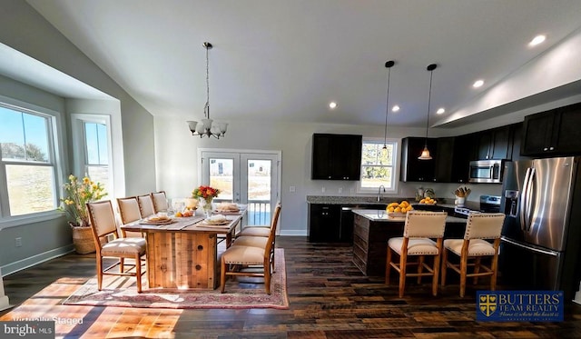 1078 Fishback Rd, Madison, VA 22727 - kitchen with stainless steel appliances, dark cabinets, dark wood-style floors, lofted ceiling, and recessed lighting