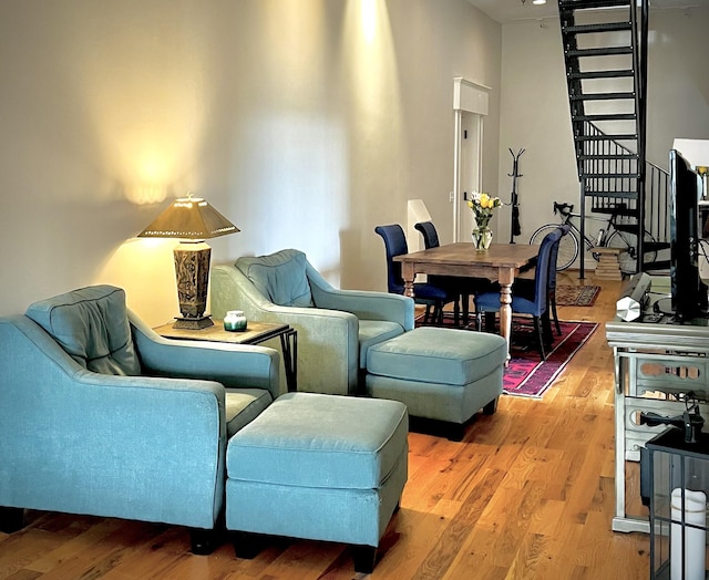sitting room featuring wood finished floors