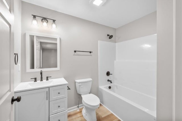 1024 D St, Waynesboro, VA 22980 - bathroom featuring vanity,  shower combination, and wood finished floors