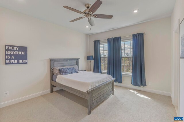 bedroom featuring baseboards, light colored carpet, recessed lighting, and ceiling fan