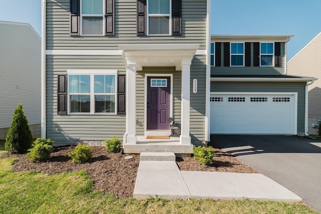 1113 Scruggs Ln, Grottoes, VA 24441 - view of front of house with aphalt driveway and an attached garage