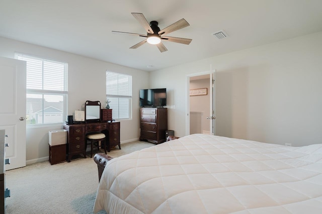 1113 Scruggs Ln, Grottoes, VA 24441 - carpeted bedroom with baseboards, visible vents, and a ceiling fan