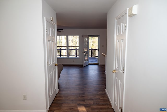4259 Shelby Rd, Rochelle, VA 22738 - corridor with dark wood finished floors, baseboards, and an upstairs landing