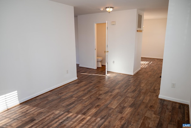 4259 Shelby Rd, Rochelle, VA 22738 - spare room with dark wood finished floors, visible vents, and baseboards