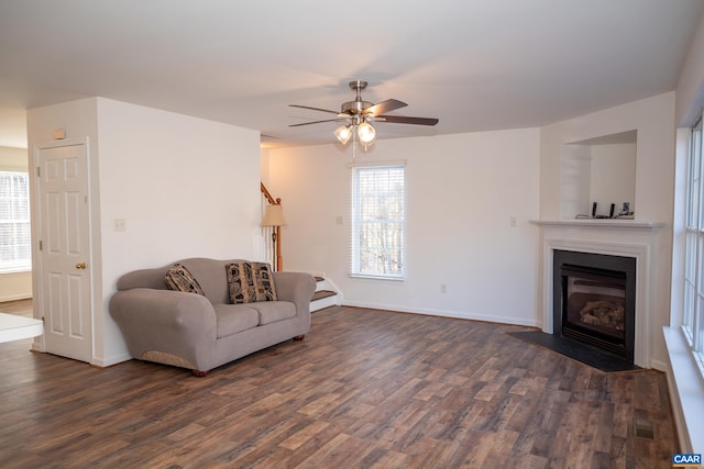4259 Shelby Rd, Rochelle, VA 22738 - living room with ceiling fan, baseboards, dark wood-style floors, and a fireplace with flush hearth
