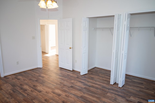 4259 Shelby Rd, Rochelle, VA 22738 - unfurnished bedroom with ceiling fan, baseboards, multiple closets, and dark wood-style floors