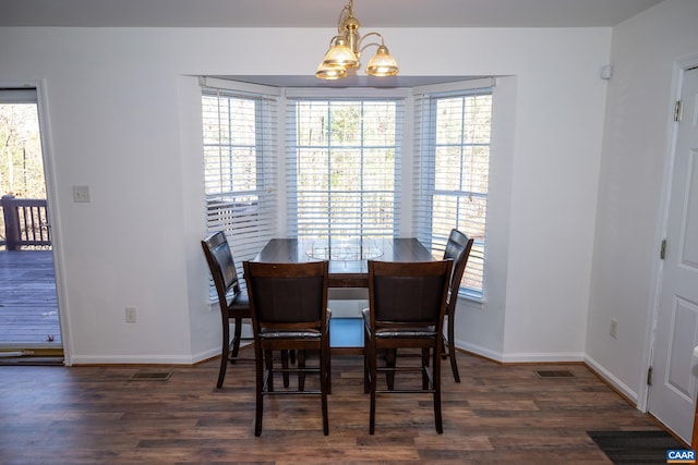 4259 Shelby Rd, Rochelle, VA 22738 - dining space with a chandelier, a healthy amount of sunlight, and wood finished floors
