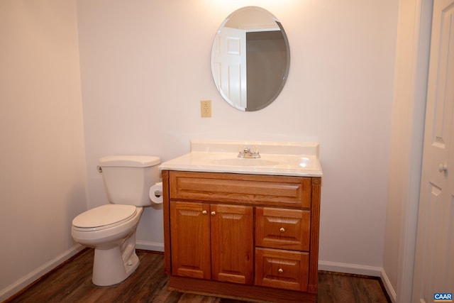 4259 Shelby Rd, Rochelle, VA 22738 - half bath featuring vanity, toilet, baseboards, and wood finished floors