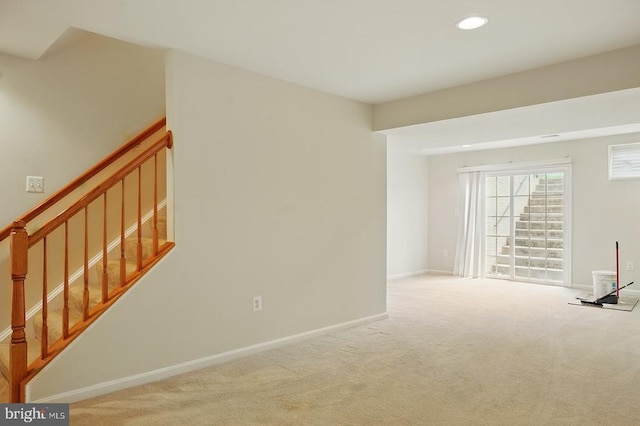 607 Woodruff Ln, Culpeper, VA 22701 - unfurnished living room with carpet flooring, recessed lighting, and stairway