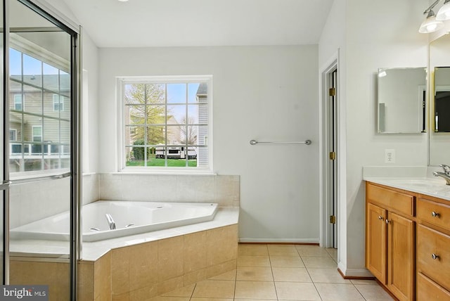607 Woodruff Ln, Culpeper, VA 22701 - full bath with vanity, a garden tub, and tile patterned floors