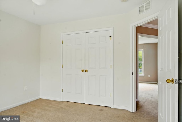607 Woodruff Ln, Culpeper, VA 22701 - unfurnished bedroom featuring light colored carpet and a closet