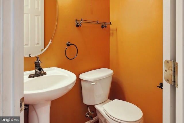 607 Woodruff Ln, Culpeper, VA 22701 - half bathroom with toilet and a sink