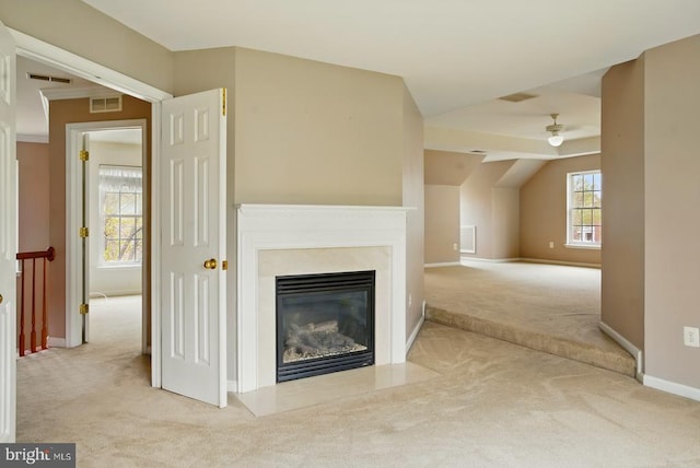 607 Woodruff Ln, Culpeper, VA 22701 - unfurnished living room featuring carpet floors, ceiling fan, and a glass covered fireplace