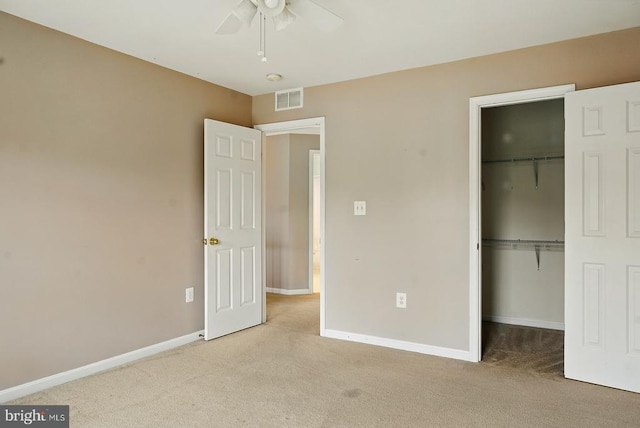607 Woodruff Ln, Culpeper, VA 22701 - unfurnished bedroom featuring carpet, a closet, a spacious closet, and a ceiling fan