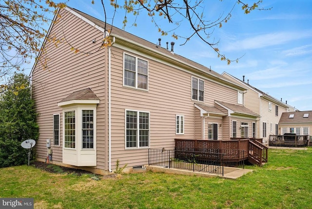 607 Woodruff Ln, Culpeper, VA 22701 - rear view of house featuring a wooden deck and a yard