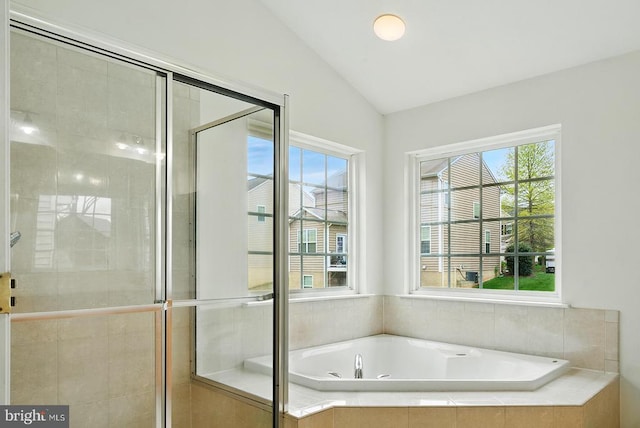 607 Woodruff Ln, Culpeper, VA 22701 - bathroom with a garden tub, vaulted ceiling, and a shower stall
