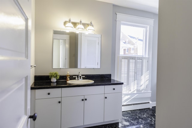 120 Jefferson St S, Lexington, VA 24450 - bathroom featuring a baseboard heating unit, vanity, and marble finish floors