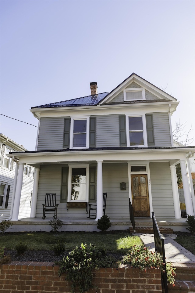 120 Jefferson St S, Lexington, VA 24450 - view of front of property with covered porch, a chimney, and metal roof