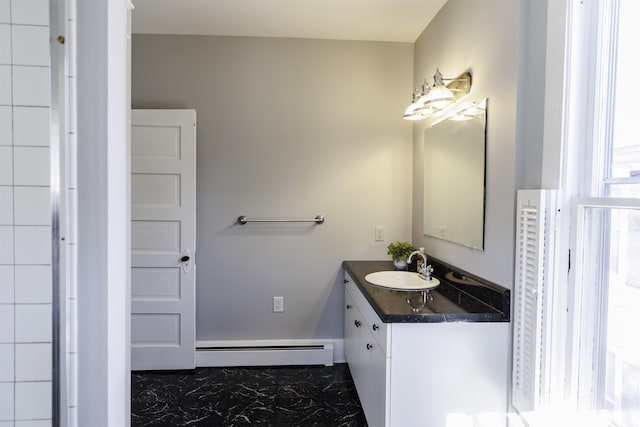 120 Jefferson St S, Lexington, VA 24450 - bathroom with a baseboard heating unit, marble finish flooring, and vanity
