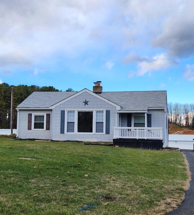 108 Parkview Dr, Waynesboro, VA 22980 - bungalow-style home with a chimney, a shingled roof, and a front lawn
