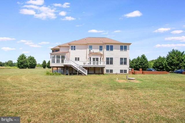 11425 Custers Trce, Spotsylvania, VA 22553 - rear view of house featuring stairs, a wooden deck, a lawn, and a sunroom