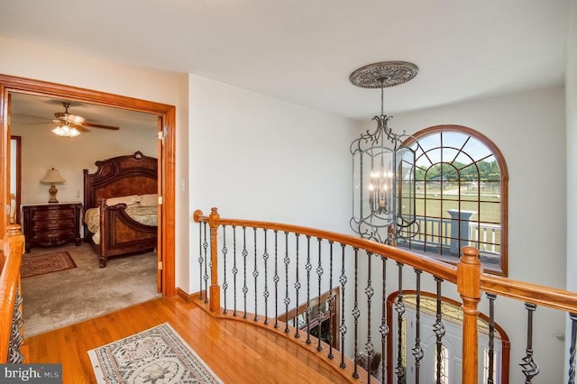 11425 Custers Trce, Spotsylvania, VA 22553 - hall with an upstairs landing, a chandelier, and wood finished floors
