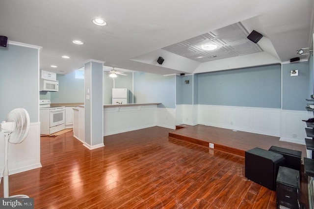 11425 Custers Trce, Spotsylvania, VA 22553 - interior space featuring freestanding refrigerator, wood finished floors, wainscoting, recessed lighting, and ceiling fan