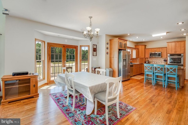11425 Custers Trce, Spotsylvania, VA 22553 - dining room featuring a chandelier, recessed lighting, light wood-style floors, and french doors