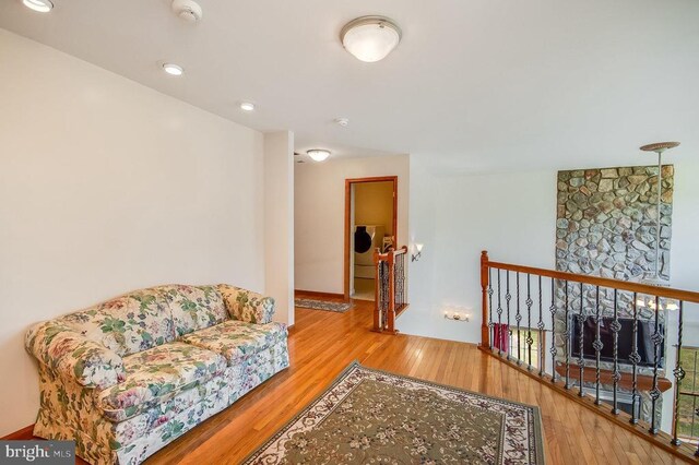 11425 Custers Trce, Spotsylvania, VA 22553 - sitting room featuring an upstairs landing and wood finished floors
