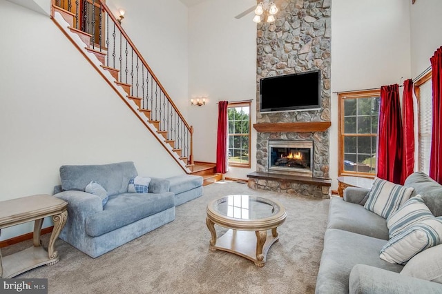 11425 Custers Trce, Spotsylvania, VA 22553 - living area featuring high vaulted ceiling, a fireplace, baseboards, a ceiling fan, and carpet floors