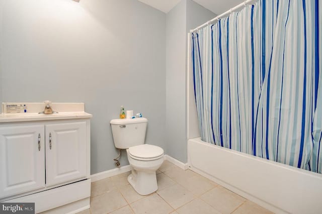 11425 Custers Trce, Spotsylvania, VA 22553 - bathroom with tile patterned flooring, toilet, a sink, shower / bath combination with curtain, and baseboards