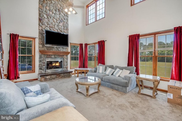 11425 Custers Trce, Spotsylvania, VA 22553 - living room with carpet flooring, a fireplace, a towering ceiling, and baseboards
