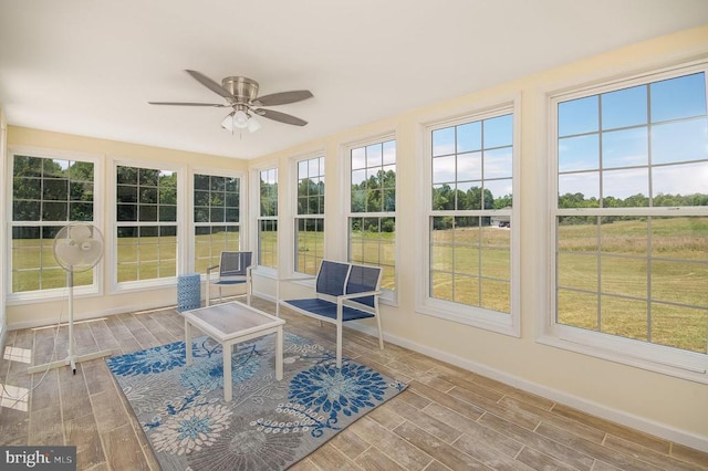 11425 Custers Trce, Spotsylvania, VA 22553 - sunroom with ceiling fan, baseboards, and wood finished floors