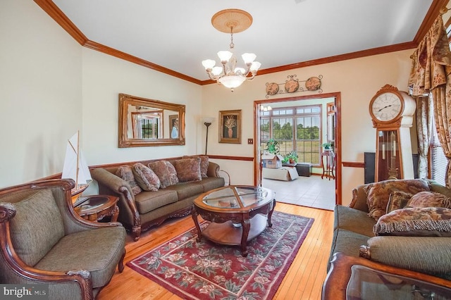 11425 Custers Trce, Spotsylvania, VA 22553 - living area with a chandelier, light wood-style flooring, and ornamental molding