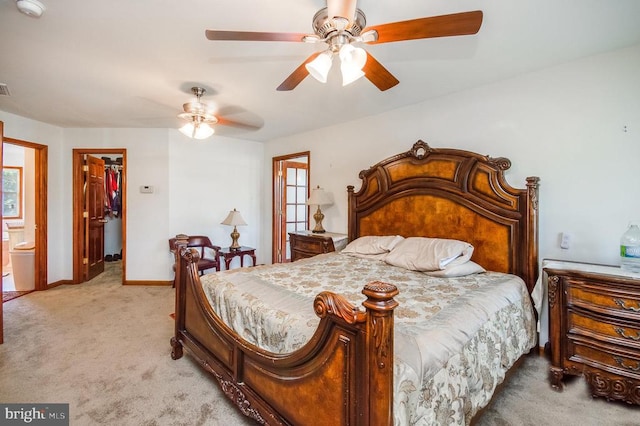11425 Custers Trce, Spotsylvania, VA 22553 - bedroom with a spacious closet, carpet flooring, a closet, ceiling fan, and baseboards