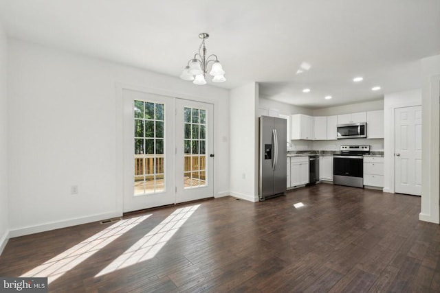 19523 Swamp Poodle Ln, Brandy Station, VA 22714 - kitchen featuring appliances with stainless steel finishes, a chandelier, recessed lighting, baseboards, and white cabinets