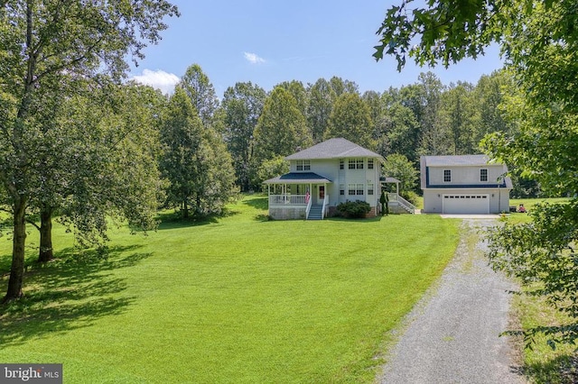 5575 Jeffersonton Rd, Jeffersonton, VA 22724 - view of front of property featuring gravel driveway, a porch, stairs, a front lawn, and a garage