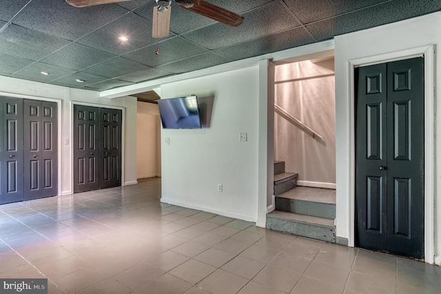 5575 Jeffersonton Rd, Jeffersonton, VA 22724 - empty room featuring a ceiling fan, tile patterned flooring, stairs, a paneled ceiling, and recessed lighting