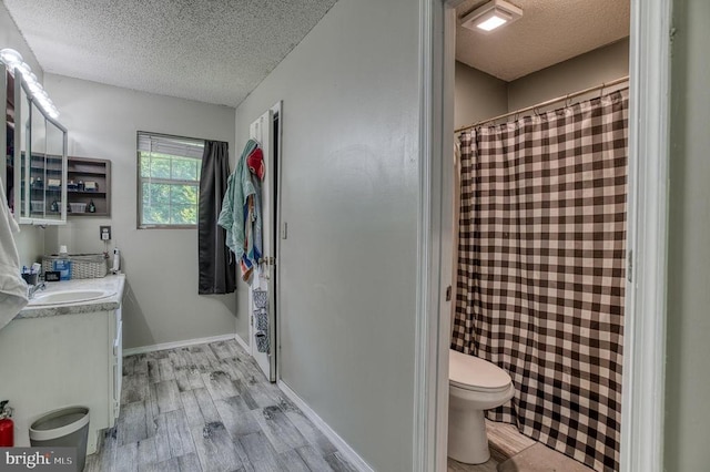 5575 Jeffersonton Rd, Jeffersonton, VA 22724 - full bath with a textured ceiling, wood finished floors, vanity, and a shower with curtain