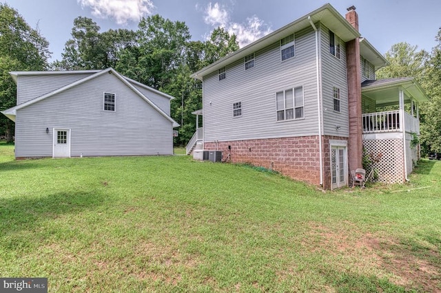 5575 Jeffersonton Rd, Jeffersonton, VA 22724 - rear view of house with a chimney and a yard