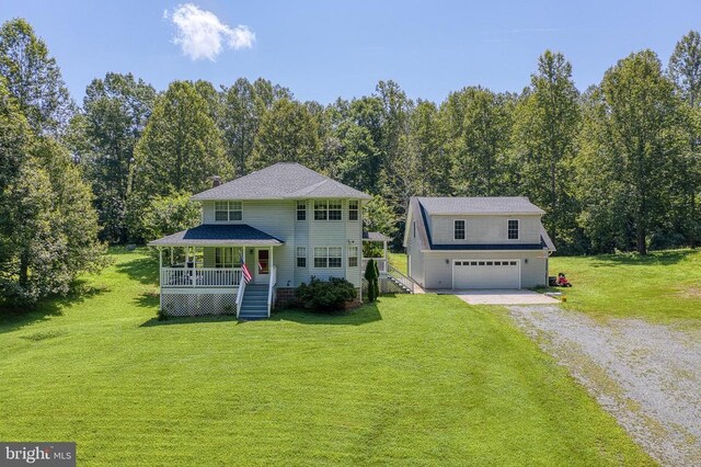 5575 Jeffersonton Rd, Jeffersonton, VA 22724 - view of front of house with stairs, driveway, a front lawn, and a garage