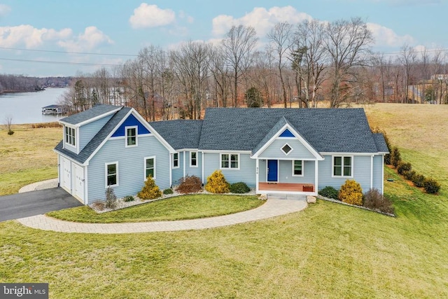 310 Elk Creek Lndg, Mineral, VA 23117 - traditional-style home featuring a porch, driveway, a garage, a front lawn, and roof with shingles