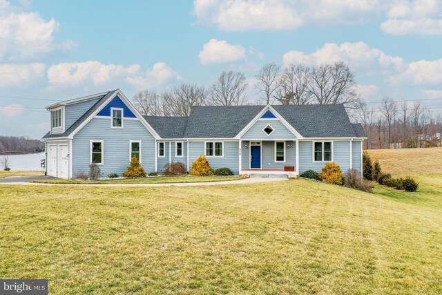 310 Elk Creek Lndg, Mineral, VA 23117 - view of front of house with covered porch, an attached garage, a front yard, and asphalt driveway