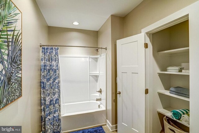 310 Elk Creek Lndg, Mineral, VA 23117 - bathroom with shower / tub combo with curtain and baseboards