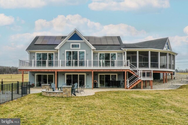 310 Elk Creek Lndg, Mineral, VA 23117 - back of house with a sunroom, a patio area, stairs, and solar panels