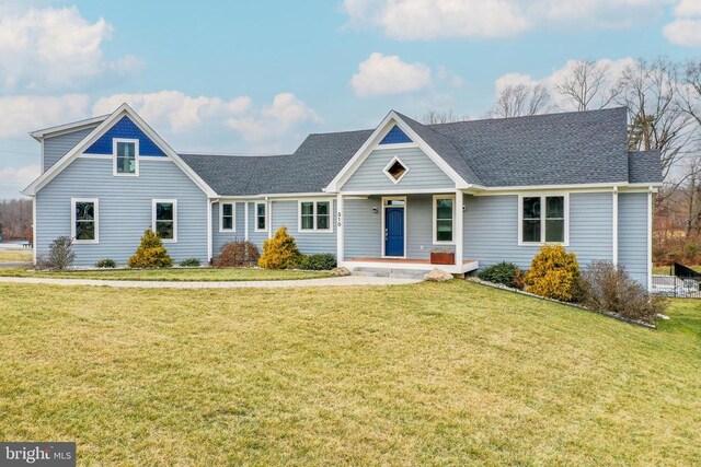310 Elk Creek Lndg, Mineral, VA 23117 - view of front of property featuring a porch, a front yard, and a shingled roof