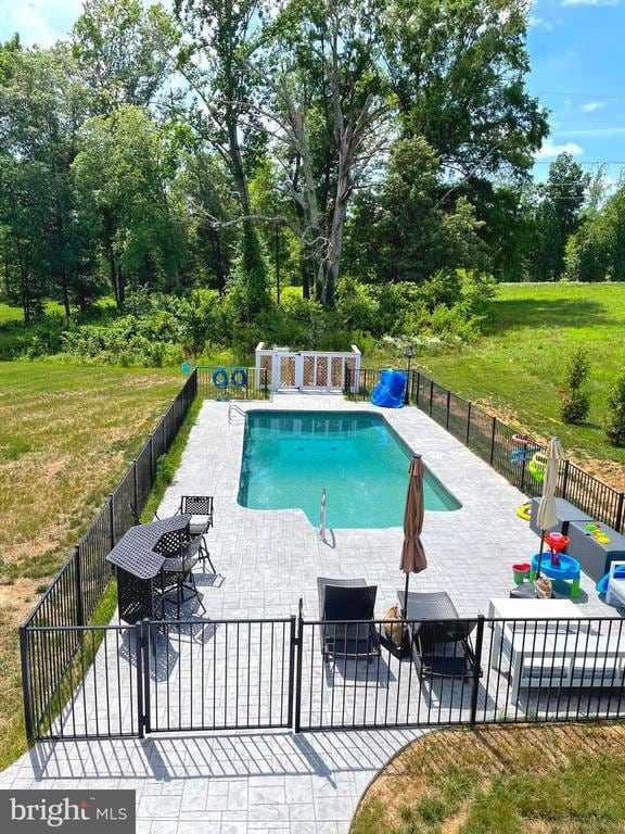 310 Elk Creek Lndg, Mineral, VA 23117 - view of swimming pool with a patio area and view of wooded area
